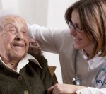 An MD2U nurse practitioner working with a home client.